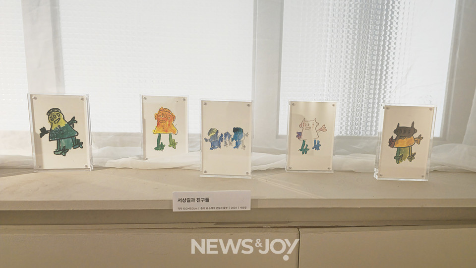 상길 씨가 자신의 화풍(?)으로 그린 숲교회 교인들. 뉴스앤조이 박요셉